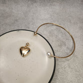 Heart on a String Pearl Neckpiece - Golden